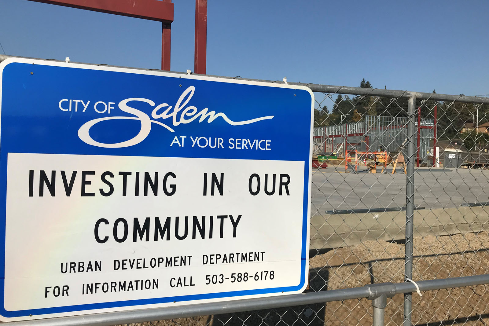 Investing in our Community Sign