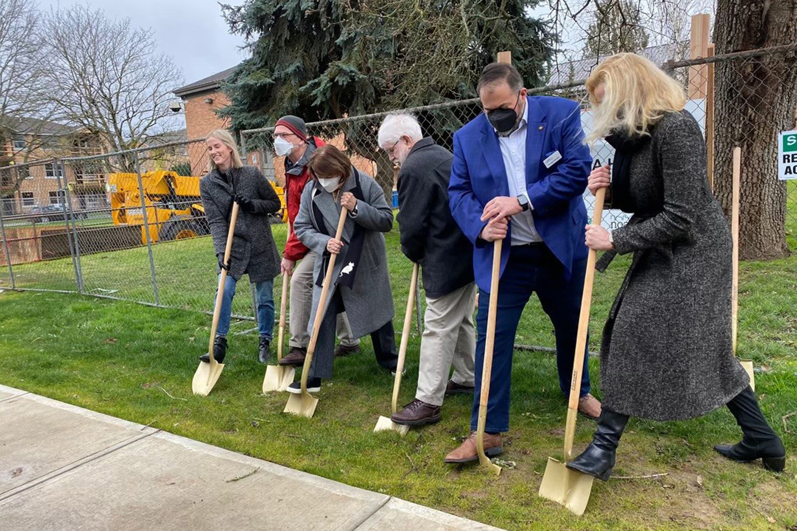 Dignitaries mark the launch of Yaquina Hall housing construction with a ground-breaking ceremony February 2.