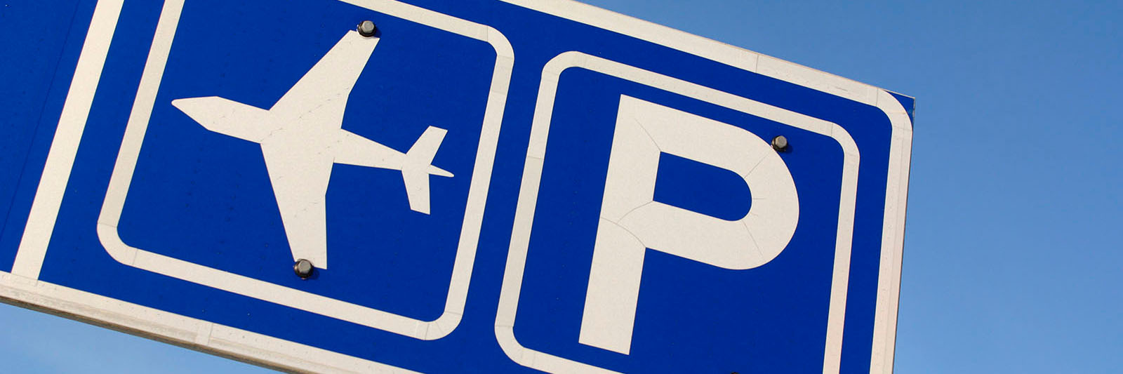 sign-depicting-airport-parking_web_1600x533