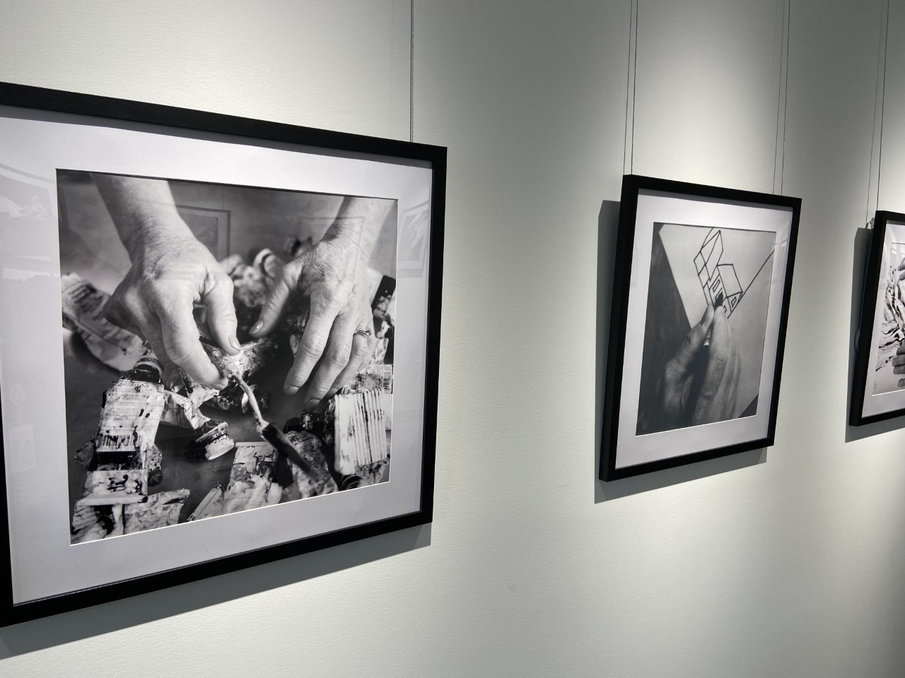 photographs of hands from library art exhibit