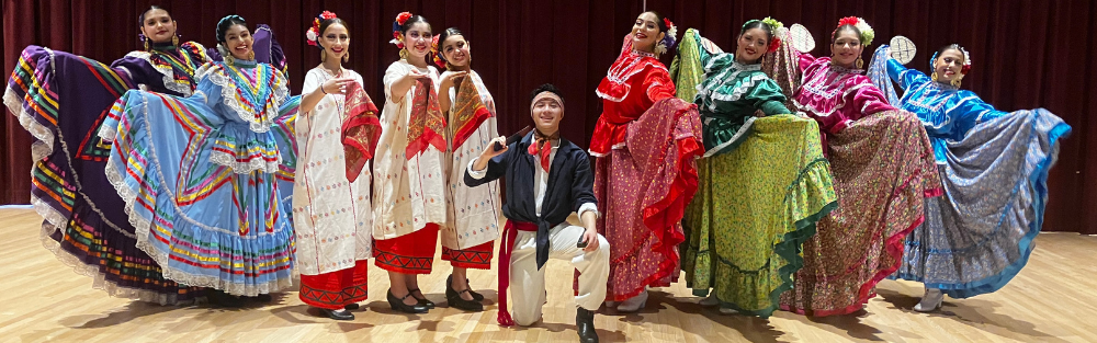 Members of Ballet Folklorico pose after a performance in Loucks Auditorium