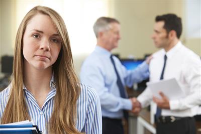 unhappy woman at workplace