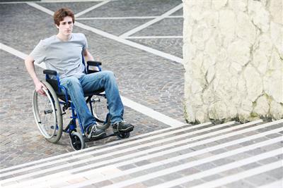 young man wheelchair inaccessible stairs