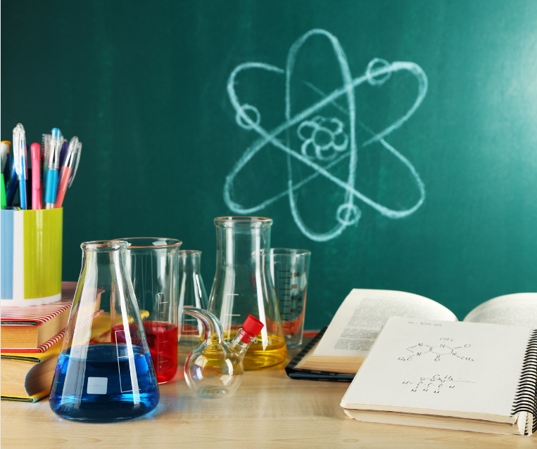 chemistry class, beakers, flasks, books, atom