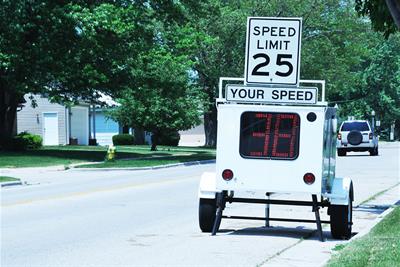 portable speed limit radar cautioning drivers to slow down