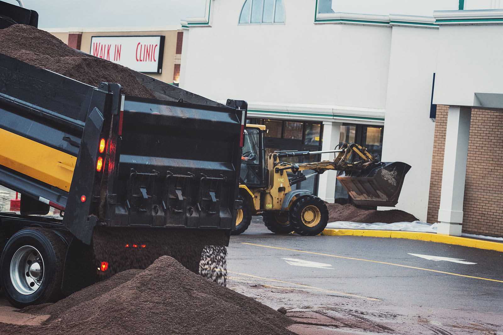Sand placed in front of shopping mall to prepare for flood waters