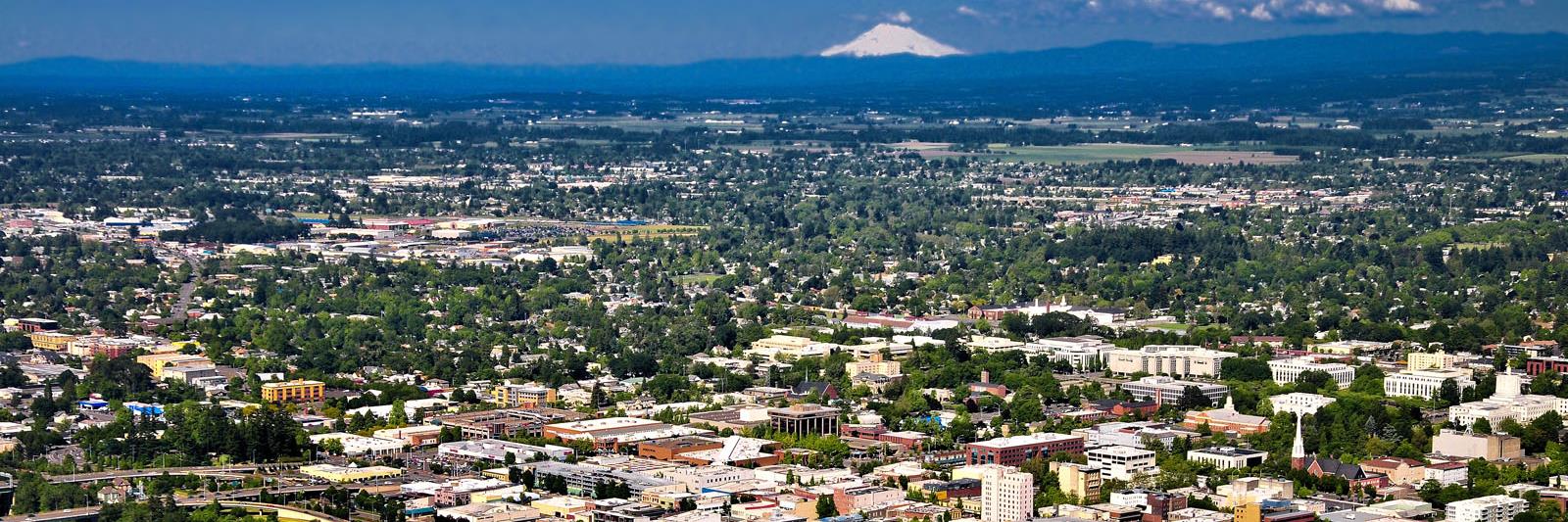 salem-downtown-with-mountains-aerial_web_1600x533_color